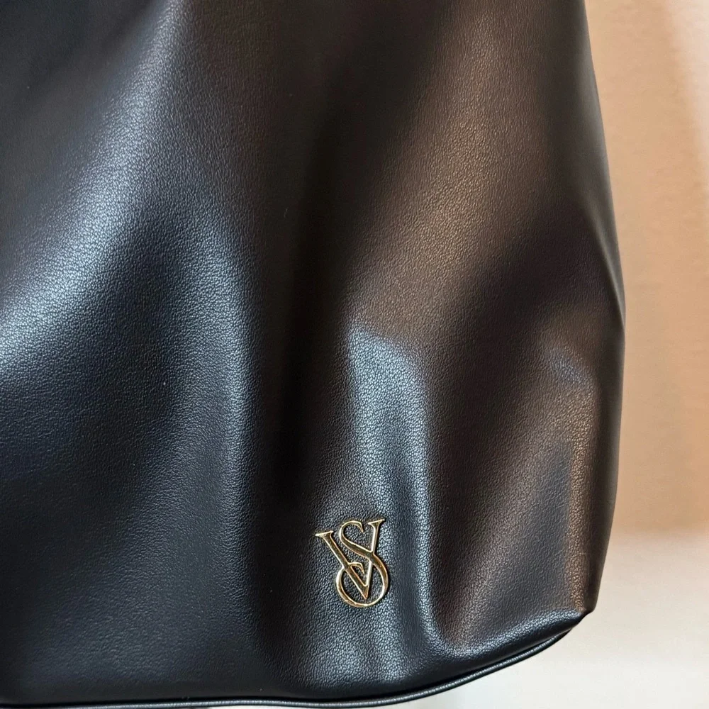 NWT Victoria’s Secret black faux leather hobo bag with bow detail